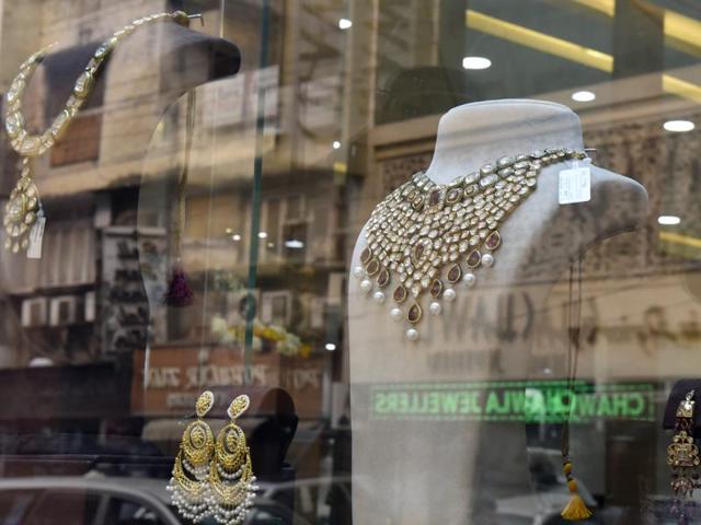 Jewellers across India started a three-day strike on Wednesday in a bid to force the government to shelve plans for a controversial excise tax announced in the union budget this week.In this picture, a jewellery shop in Delhi is seen. (Ravi Choudhary/HT Photo) Jewellers across India started a three-day strike on Wednesday in a bid to force the government to shelve plans for a controversial excise tax announced in the union budget this week.In this picture, a jewellery shop in Delhi is seen. (Ravi Choudhary/HT Photo)