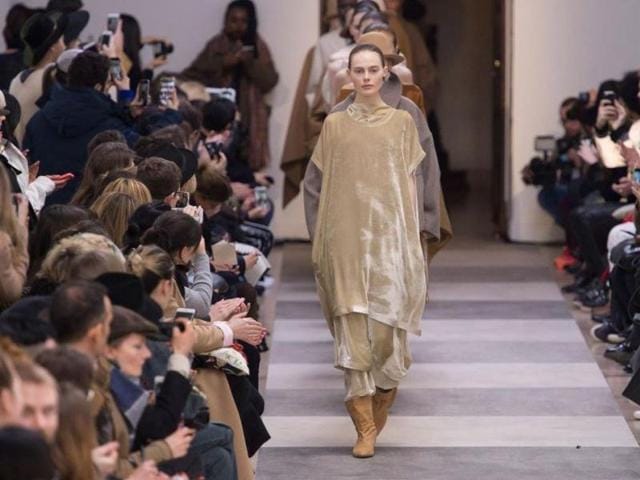 Nehera: With clean, simple lines, Samuel Drira’s collection for Nehera brought muted shades to the catwalk, with white, beige and camel tones. Cuts were loose, with certain looks channeling an androgynous vibe. One of this collection’s standout pieces was a long, baggy jacket with a pocket round the back like a built-in backpack. (March 1, 2016). (AFP) 