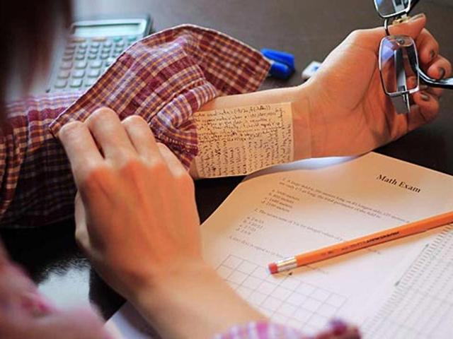 A handful of students this year also took away the answer sheets. At one centre, they locked the gate to hold the flying squad outside for about 10 minutes before it seized huge photocopied material as evidence of mass copying. (Representational picture) A handful of students this year also took away the answer sheets. At one centre, they locked the gate to hold the flying squad outside for about 10 minutes before it seized huge photocopied material as evidence of mass copying. (Representational picture)