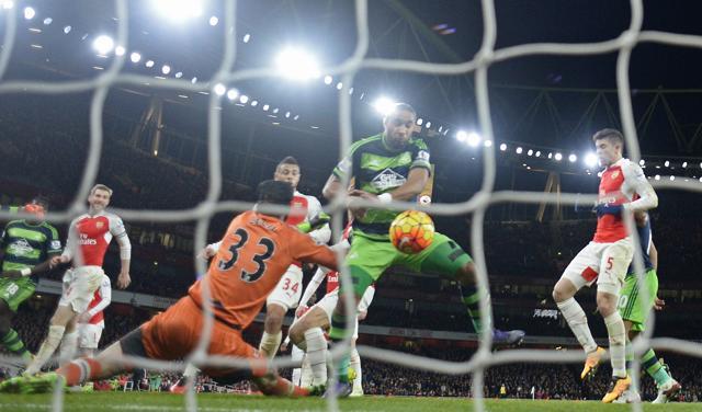Swansea captain Ashley Williams scores the winner past Petr Cech. (Reuters Photo) Swansea captain Ashley Williams scores the winner past Petr Cech. (Reuters Photo)