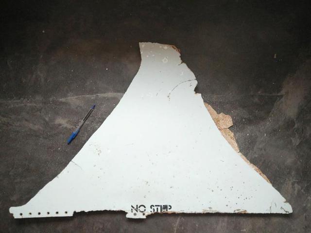 A suspected piece of aircraft debris was found on the coast of Mozambique, with Malaysia's transport minister saying there was a "high possibility" it came from a Boeing 777, the same model as missing flight MH370. (AFP Photo) A suspected piece of aircraft debris was found on the coast of Mozambique, with Malaysia's transport minister saying there was a "high possibility" it came from a Boeing 777, the same model as missing flight MH370. (AFP Photo)
