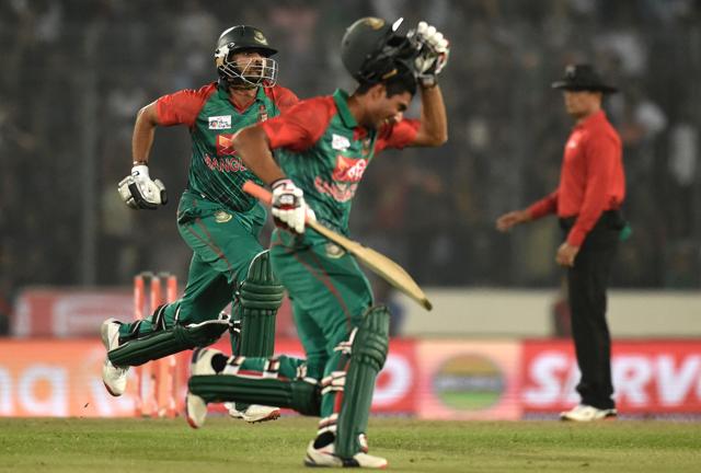 The Bangladesh cricket team celebrates its win over Pakistan in the Asia Cup T20, their third straight win of the tournament. (AFP Photo) The Bangladesh cricket team celebrates its win over Pakistan in the Asia Cup T20, their third straight win of the tournament. (AFP Photo)