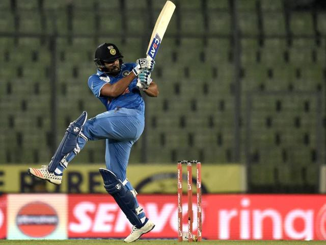 Rohit Sharma plays a shot during the Asia Cup T20 cricket tournament match between United Arab Emirates and India at The Sher-e-Bangla National Cricket Stadium. (AFP Photo) 