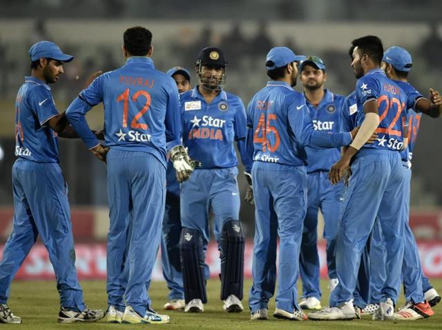 Indian cricketers celebrate after the dismissal of unseen United Arab Emirates batsman Muhammad Kaleem. (AFP Photo) 