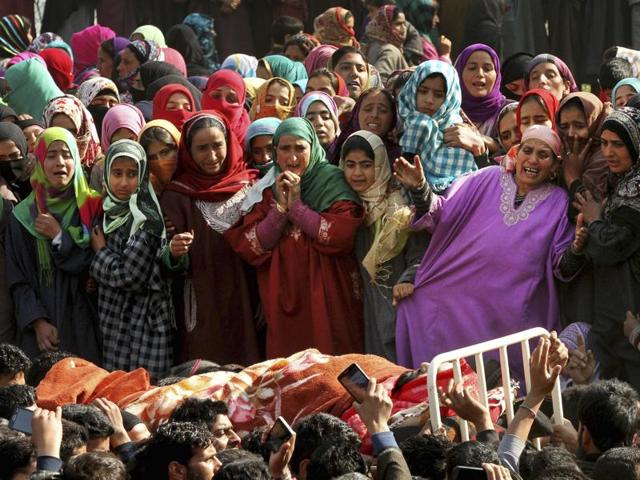 Women wail as they watch the body of a militant, during his funeral procession in Dadsar village, 40 kilometers (25 miles) south of Srinagar. (AP Photo) Women wail as they watch the body of a militant, during his funeral procession in Dadsar village, 40 kilometers (25 miles) south of Srinagar. (AP Photo)
