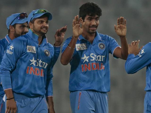 India’s Jasprit Bumrah, second right, celebrate with his teammates the dismissal of Sri Lanka’s Shehan Jayasuriya.(AP Photo)