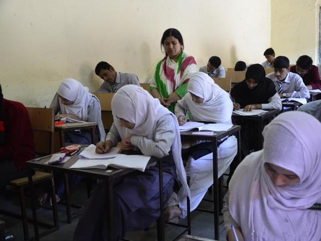 Students write Urdu exam at Govt Jahangiria Higher Secondary School in Bhopal on Wednesday. (Mujeeb Faruqui/HT photo) Students write Urdu exam at Govt Jahangiria Higher Secondary School in Bhopal on Wednesday. (Mujeeb Faruqui/HT photo)