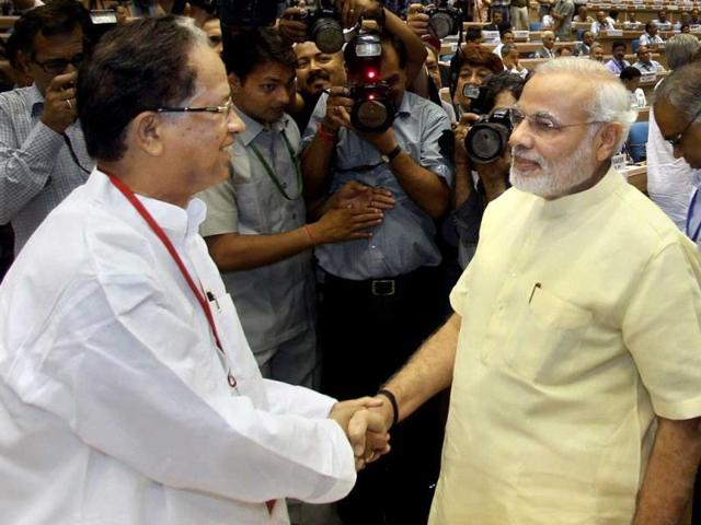 Narendra Modi shake hands with Assam chief minister Tarun Gogoi during the chief ministers' conference on internal security in New Delhi. (PTI Photo) Narendra Modi shake hands with Assam chief minister Tarun Gogoi during the chief ministers' conference on internal security in New Delhi. (PTI Photo)