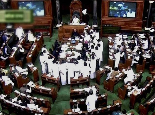 Prime Minister Narendra Modi and other ministers in the Rajya Sabha in New Delhi on Wednesday. (PTI) Prime Minister Narendra Modi and other ministers in the Rajya Sabha in New Delhi on Wednesday. (PTI)