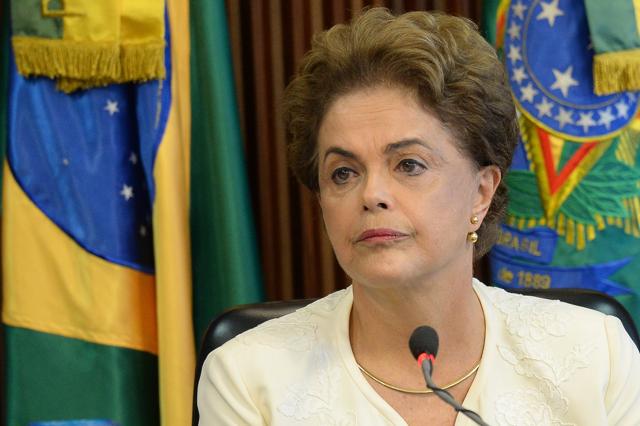 Brazilian President Dilma Rousseff gestures during a meeting at Palace Planalto in Brasilia on March 4, 2016. Police searched the home of Brazil's powerful ex-president Luiz Inacio Lula da Silva and detained him for questioning Friday in a probe into a huge corruption scheme. (AFP Photo) Brazilian President Dilma Rousseff gestures during a meeting at Palace Planalto in Brasilia on March 4, 2016. Police searched the home of Brazil's powerful ex-president Luiz Inacio Lula da Silva and detained him for questioning Friday in a probe into a huge corruption scheme. (AFP Photo)