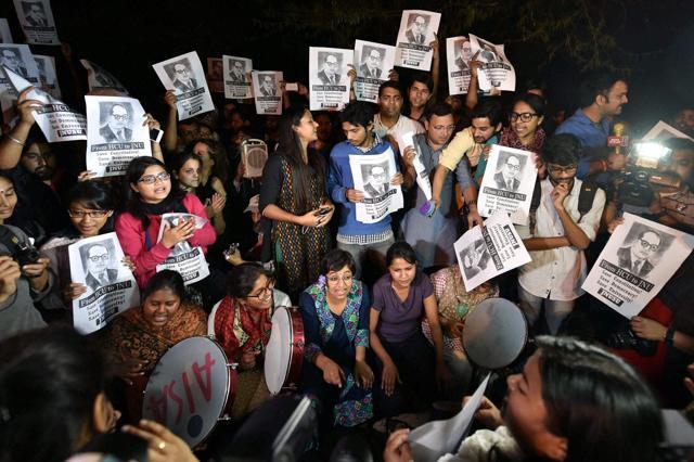 JNU students welcome JNUSU President Kanhaiya Kumar after he reached at the campus upon his release on bail, in New Delhi. (PTI) JNU students welcome JNUSU President Kanhaiya Kumar after he reached at the campus upon his release on bail, in New Delhi. (PTI)