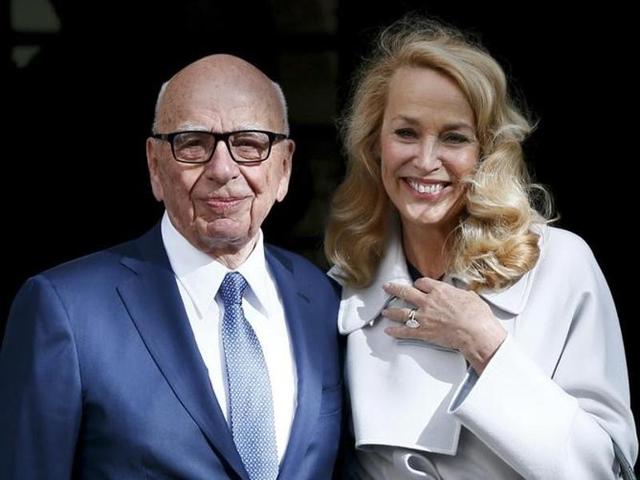 News Corp executive chairman Rupert Murdoch and Jerry Hall leave Spencer House, London, after getting married on Friday. (AP Photo) News Corp executive chairman Rupert Murdoch and Jerry Hall leave Spencer House, London, after getting married on Friday. (AP Photo)