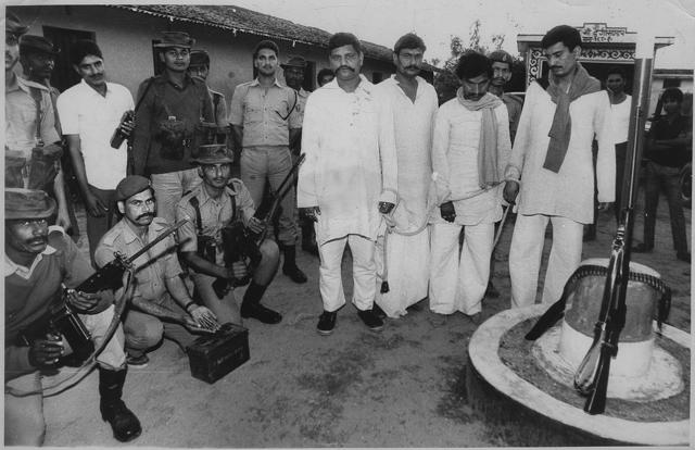 Paramilitary personnel with four persons arrested with firearms on the eve of assembly elections in Bihar in March 1990 (Hindustan Times file photo) Paramilitary personnel with four persons arrested with firearms on the eve of assembly elections in Bihar in March 1990 (Hindustan Times file photo)