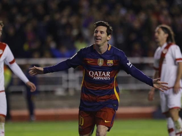 Barcelona's Lionel Messi celebrates after scoring his side's third goal against Rayo Vallecano during a La Liga soccer match. (AP) Barcelona's Lionel Messi celebrates after scoring his side's third goal against Rayo Vallecano during a La Liga soccer match. (AP)