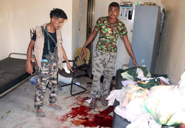 Yemeni pro-government fighters, loyal to exiled Yemeni President Abedrabbo Mansour Hadi, inspect an elderly care home in Aden after it was attacked by gunmen on Thursday. (AFP) Yemeni pro-government fighters, loyal to exiled Yemeni President Abedrabbo Mansour Hadi, inspect an elderly care home in Aden after it was attacked by gunmen on Thursday. (AFP)