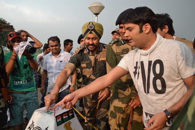 Stand-up comedian Kapil Sharma interacts with soldiers during his visit to Attari-Wagah border. (IANS)