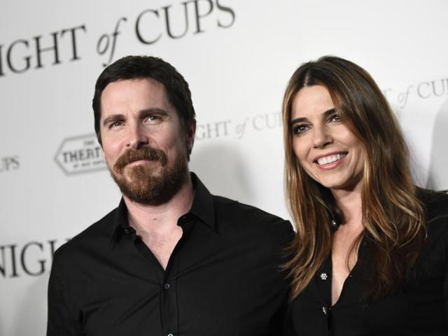 Christian Bale, left, a cast member in Knight of Cups, poses with his wife Sibi Blazic at the premiere of the film in Los Angeles. (Chris Pizzello/Invision/AP) Christian Bale, left, a cast member in Knight of Cups, poses with his wife Sibi Blazic at the premiere of the film in Los Angeles. (Chris Pizzello/Invision/AP)