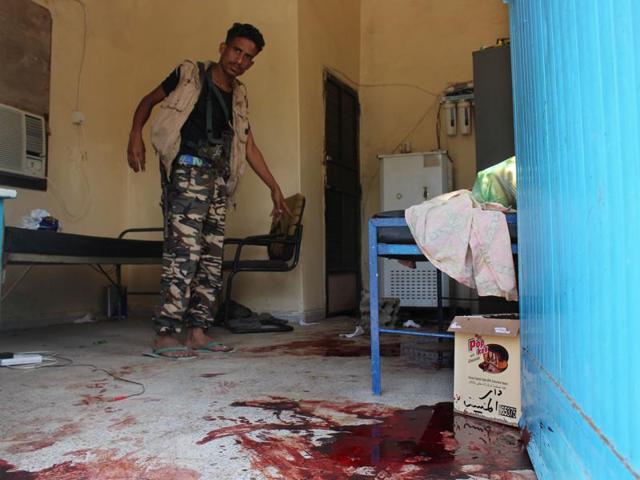 A Yemeni man inspects an elderly care home after it was attacked by gunmen in the port city of Aden, Yemen. (AP Photo) A Yemeni man inspects an elderly care home after it was attacked by gunmen in the port city of Aden, Yemen. (AP Photo)