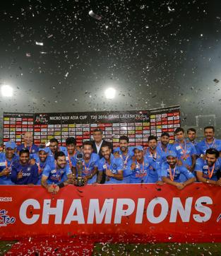 Indian players and support staff pose with the trophy after winning the Asia Cup. (AP) Indian players and support staff pose with the trophy after winning the Asia Cup. (AP)