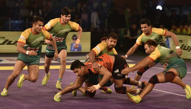 Players of UMumba celebrate after they won the Pro Kabaddi League