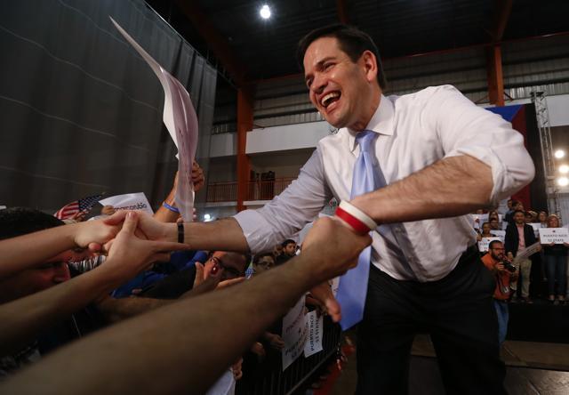 Republican presidential candidate Marco Rubio shakes hands with his supporters at a rally in Toa Baja, Puerto Rico, on Saturday. (AP) Republican presidential candidate Marco Rubio shakes hands with his supporters at a rally in Toa Baja, Puerto Rico, on Saturday. (AP)