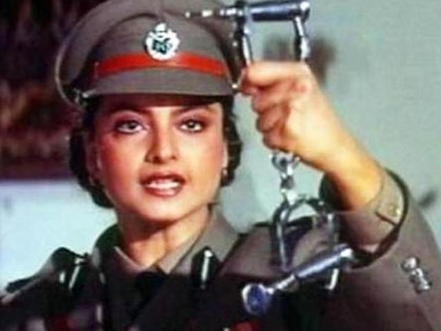 Rekha plays a cop in Phool Baney Angaarey. Rekha plays a cop in Phool Baney Angaarey.
