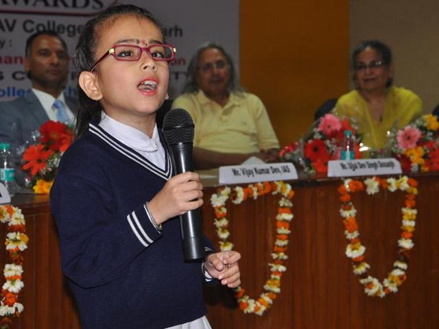A school student during a function to celebrate International Women’s Day. (HT Photo )