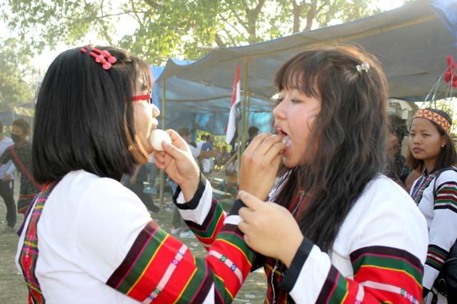 The egg part of Chhawnghnawh staged a comeback during the spring-heralding Chapchar Kut festival in northern Mizoram’s Kolasib district on Friday, more than a century after it vanished from the celebrations. (HT Photo) The egg part of Chhawnghnawh staged a comeback during the spring-heralding Chapchar Kut festival in northern Mizoram’s Kolasib district on Friday, more than a century after it vanished from the celebrations. (HT Photo)