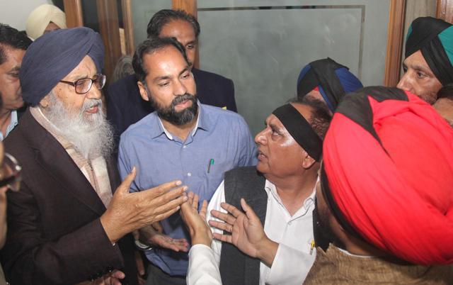 Punjab chief minister Parkash Singh Badal pacified them and urged them to allow other MLAs to enter. Eventually, there was a five minute delay in the governor’s address. (Keshav Singh/HT Photo) Punjab chief minister Parkash Singh Badal pacified them and urged them to allow other MLAs to enter. Eventually, there was a five minute delay in the governor’s address. (Keshav Singh/HT Photo)
