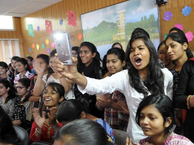 Students during a programme on “International Women’s Day” at Dev Samaj College, Chandigarh. (Gurminder Singh/ HT )