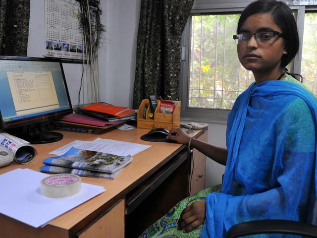 Rekha Rathore from Indore, Madhya Pradesh, teaches in Indore while pursuing graduation. Asked to choose between education and her husband, she opted for both.(Shankar Mourya / HT Photo)