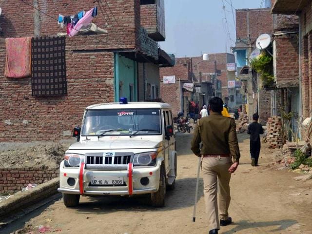Police deployed at Tigri village after the rape of a minor girl in Greater Noida on Monday. (Sunil Sharma / HT Photo) Police deployed at Tigri village after the rape of a minor girl in Greater Noida on Monday. (Sunil Sharma / HT Photo)