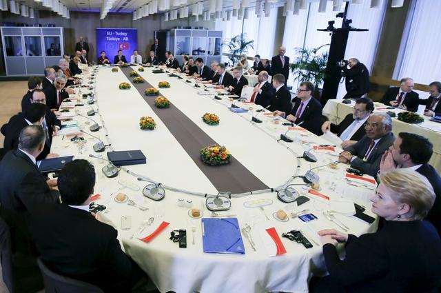 European Union leaders attend a lunch meeting with Turkish Prime Minister Ahmet Davutoglu during an EU-Turkey summit in Brussels, as the bloc is looking to Ankara to help it curb the influx of refugees and migrants flowing into Europe. (REUTERS) European Union leaders attend a lunch meeting with Turkish Prime Minister Ahmet Davutoglu during an EU-Turkey summit in Brussels, as the bloc is looking to Ankara to help it curb the influx of refugees and migrants flowing into Europe. (REUTERS)