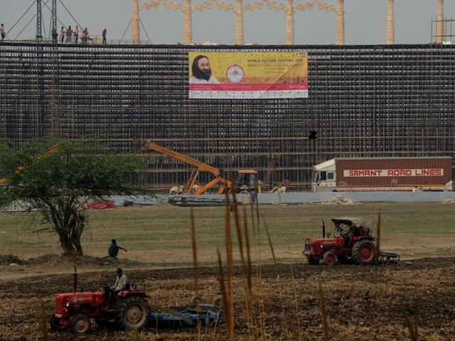 The mega-event marking 35 years of the foundation ran into fresh trouble after army men were seen helping the non-governmental organisation in the construction process ahead of the programme. (AFP) The mega-event marking 35 years of the foundation ran into fresh trouble after army men were seen helping the non-governmental organisation in the construction process ahead of the programme. (AFP)