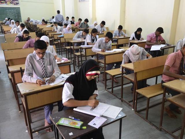 Students taking examination of MP board high school at Government Jahangiria higher secondary school in Bhopal.(Mujeeb Faruqui/ HT file photo)