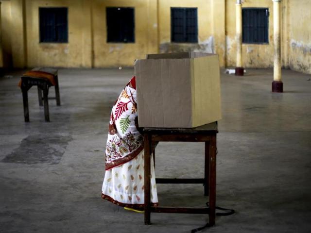A woman casts her vote during the first phase of elections in Dibrugarh. Poll pundits say the BJP and the AGP have taken more of their disadvantages along in their bid to win mandate 2016 together. (AFP File Photo) A woman casts her vote during the first phase of elections in Dibrugarh. Poll pundits say the BJP and the AGP have taken more of their disadvantages along in their bid to win mandate 2016 together. (AFP File Photo)