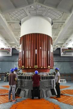 Placement of the nozzle end segment of PSLV-C32 first stage over the Launch Pedestal. (Picture courtesy: Isro) Placement of the nozzle end segment of PSLV-C32 first stage over the Launch Pedestal. (Picture courtesy: Isro)