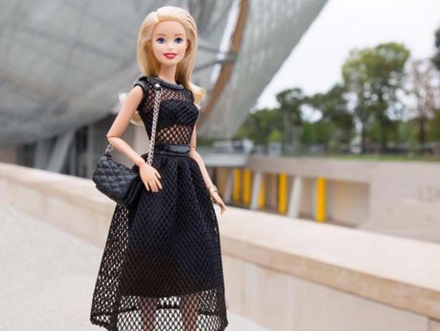 This dress is just perfect. Wait while we check if it is available for humans. (Mattel) 