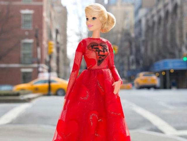 Barbie is off to a movie premiere. Do you feel jealous of a plastic toy right now? We do too.  (Mattel) 