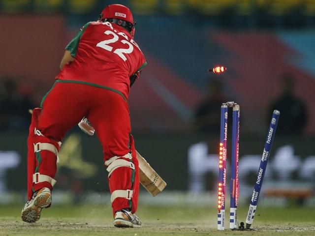 Oman's Amir Ali gets clean bowled on a no-ball. (AP) 