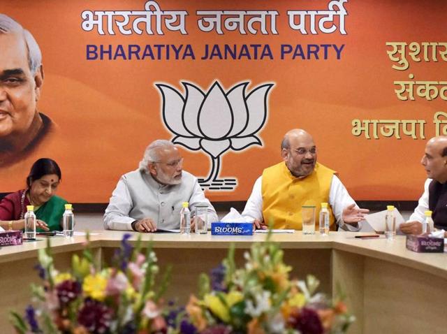 BJP leaders at an election campaign committee meeting in New Delhi, to discuss the upcoming assembly poll in Assam and West Bengal.(PTI Photo)