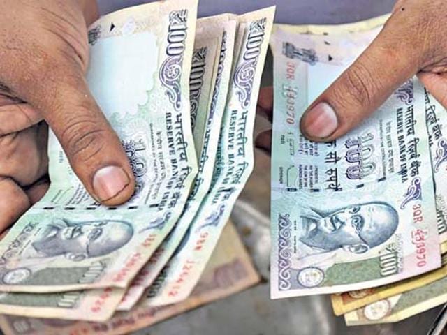 The rupee strengthened by another 14 paise to close at 67.07 Thursday against dollar. (Representational Photo) The rupee strengthened by another 14 paise to close at 67.07 Thursday against dollar. (Representational Photo)