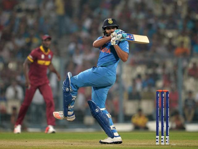 Rohit Sharma plays a shot during a warm-up match between India and West Indies. (AFP Photo) Rohit Sharma plays a shot during a warm-up match between India and West Indies. (AFP Photo)
