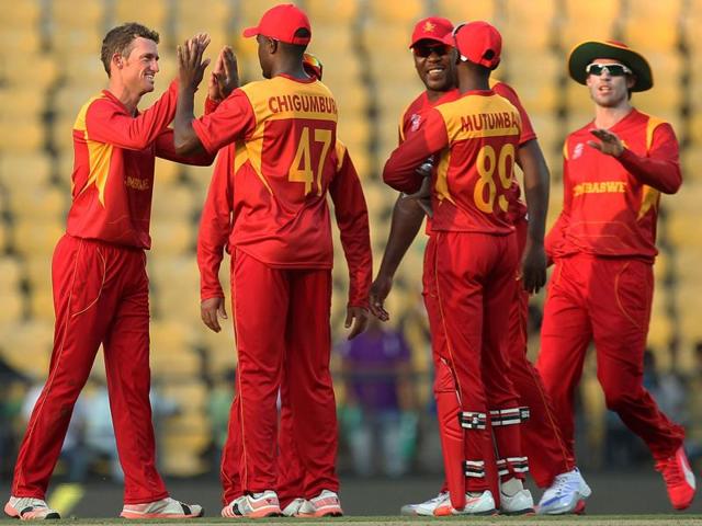 Zimbabwe's Sean Williams celebrates with teammates. (AFP Photo)