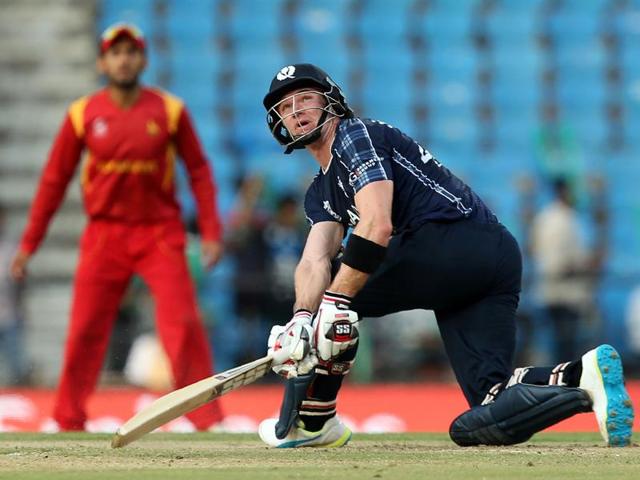 Scotland's Richie Berrington watches the ball after playing a shot during the World T20. (AFP Photo)