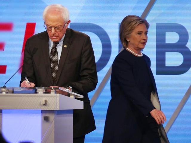 Democratic presidential candidates Bernie Sanders and Hillary Clinton are seen on stage during the Democratic Presidential Primary Debate at the Miami Dade College's Kendall Campus in Miami, Florida. (AFP Photo) Democratic presidential candidates Bernie Sanders and Hillary Clinton are seen on stage during the Democratic Presidential Primary Debate at the Miami Dade College's Kendall Campus in Miami, Florida. (AFP Photo)