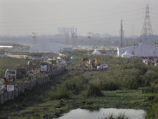The Rs 5 crore environmental compensation imposed on the foundation is only the initial penalty as the rest of the fine amount will be decided after an NGT-appointed committee assesses the damage to the floodplain(AP) The Rs 5 crore environmental compensation imposed on the foundation is only the initial penalty as the rest of the fine amount will be decided after an NGT-appointed committee assesses the damage to the floodplain(AP)