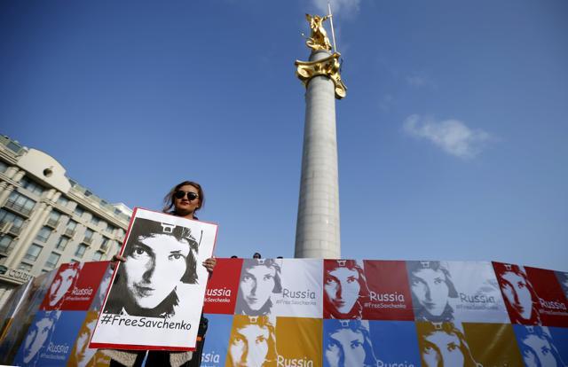 A woman attends a rally demanding the liberation of Savchenko by Russia at the Freedom Square in Tbilisi, Georgia on Wednesday. (REUTERS) A woman attends a rally demanding the liberation of Savchenko by Russia at the Freedom Square in Tbilisi, Georgia on Wednesday. (REUTERS)