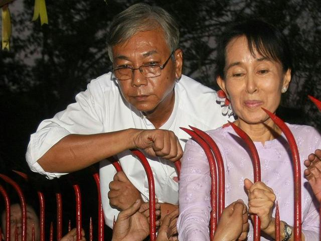 In this file picture taken on November 13, 2010, Htin Kyaw (L) stands next to Aung San Suu Kyi (R) at her residence on the day of her release from house arrest in Yangon where she was detained for nearly two decades. (AFP) In this file picture taken on November 13, 2010, Htin Kyaw (L) stands next to Aung San Suu Kyi (R) at her residence on the day of her release from house arrest in Yangon where she was detained for nearly two decades. (AFP)