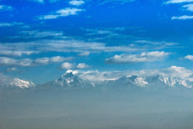 While in Kausani, you can sit back and gaze at the Himalayas until the sun decides to call it a day and then count the number of empty tea cups. As the orange fades away on the Himalayas during twilight, the Trisul peaks resemble the iconic Paramount Pictures logo. (Hindustan Times) While in Kausani, you can sit back and gaze at the Himalayas until the sun decides to call it a day and then count the number of empty tea cups. As the orange fades away on the Himalayas during twilight, the Trisul peaks resemble the iconic Paramount Pictures logo. (Hindustan Times)